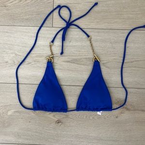 Blue triangle top and gold strap